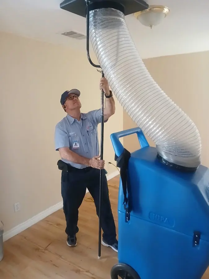 Mini Split Installation technician using HEPA equipment in Hurricane